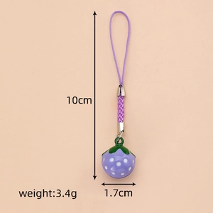 Detailed view of purple strawberry bell charm with white dots and dimensions 10cm by 1.7cm