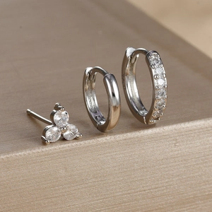 Macro detail of silver S925 sterling silver earring set with cubic zirconia stones