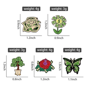 Detail showing dollar-themed enamel pins with precise size and weight measurements
