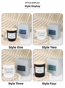 Detail of black and white frosted glass scented candles with natural wood lids and gift box