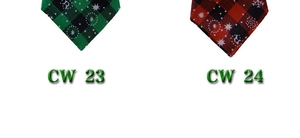 Detailed texture of green and red plaid pet bandanas with white snowflake patterns
