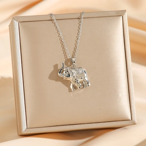 Silver mammoth elephant pendant necklace with diamonds on luxury jewelry display box