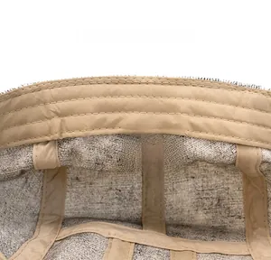 Detail view of the 100% cotton care label inside a vintage-style washed newsboy cap