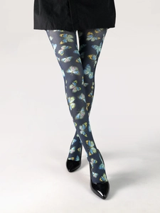 Detailed view of sheer tights featuring vibrant butterfly prints and black patent heels