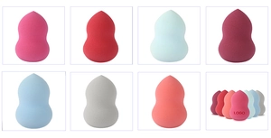 Close-up of assorted colorful teardrop makeup sponges in various vibrant pastel shades