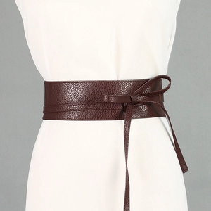 Dark brown wide waist corset belt with bow tie detail for dresses and coats