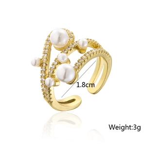 Detail view of 18K gold plated ring with pearls and zircons showing 1.8cm diameter and 3g weight