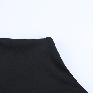 Close-up of the black slim-fit T-shirt showing high-quality stitching and fabric texture