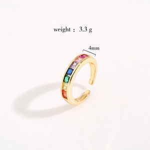 Gold open ring featuring colorful rainbow zircon stones and geometric square cut design