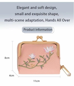Detail of pink lychee leather mini bag with lotus embroidery and gold metal clasp