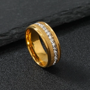 Brushed gold stainless steel ring with a single row of square zirconias on stone
