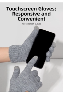 Detail of grey knitted gloves with conductive fiber tips for smartphone touchscreen use