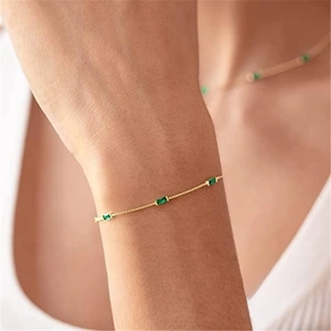 925 sterling silver gold bracelet with three sparkling green rectangle zircons