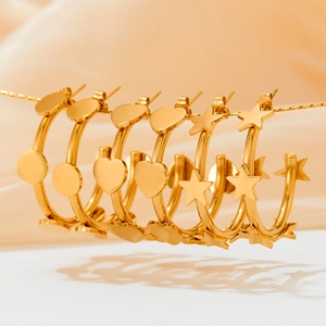 Polished 18K gold plated stainless steel hoop earrings in heart star and circle shapes