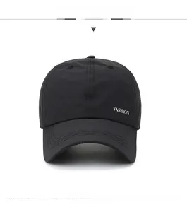 Detailed front view of mesh baseball cap featuring white 'FASHION' letter embroidery