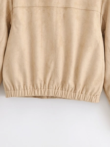 Detail of khaki faux suede jacket showing back seam and elastic hem for a perfect fit