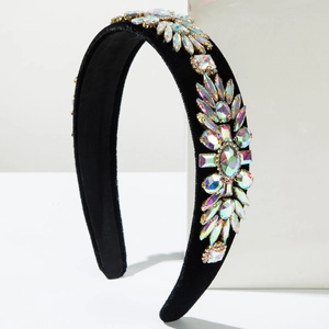 Luxurious black velvet headband featuring iridescent rhinestones in floral patterns