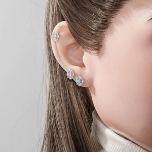 Minimalist geometric egg-shaped zircon cartilage stud earrings set in silver finish