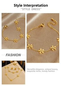 Detail of gold flower jewelry set with sparkling stones on elegant silk fabric background