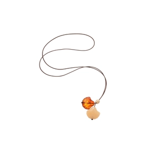 Ethnic wood bead necklace with amber and cream shell pendants on a brown cord