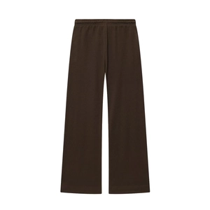 Detail view of chocolate brown wide-leg knit trousers with elastic drawstring waistband