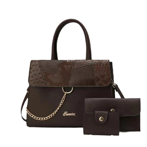 Three-piece women's handbag set in chocolate brown embossed leather with gold chain details