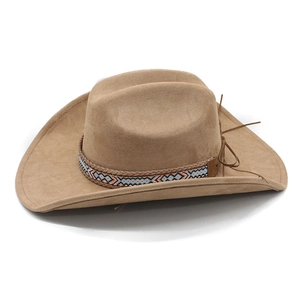 Close-up of camel suede cowboy hat featuring ethnic geometric band and leather cord detail