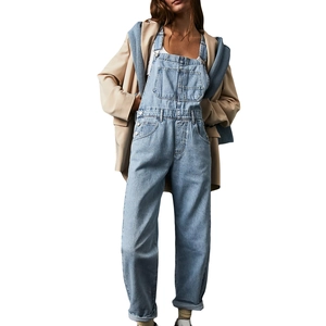 Relaxed fit light blue denim dungarees with multiple pockets and adjustable straps