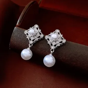 French vintage silver needle pearl drop earrings with hollow rhinestone floral base