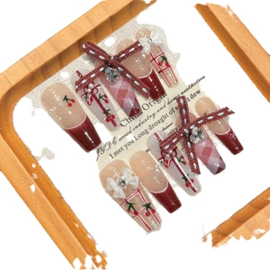 Handmade red cherry press-on nails with 3D bows and heart rhinestones in coffin shape