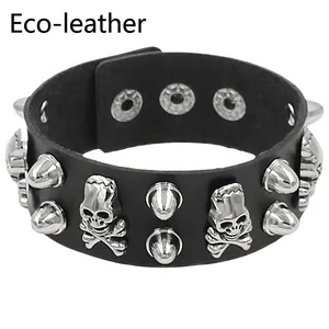 Detailed macro view of eco-friendly leather strap with silver skull and cone studs