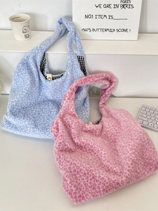 Chic leopard print plush tote bags in blue and pink with checkered lining and soft texture