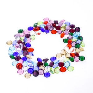 Colorful faceted round rhinestones for DIY jewelry and accessories on white background