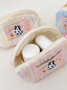 Cute knitted earphone pouch with dalmatian embroidery in pink white and blue colors