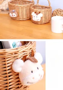 Detail of handmade wicker storage basket with cute plush cartoon animal decoration