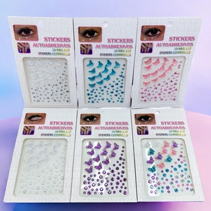 Detailed set of 3D facial gemstone stickers featuring butterflies, pearls, and jewels