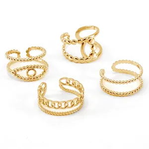 Set of four 18K gold plated stainless steel open rings with vintage textures