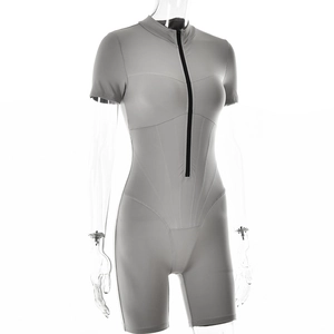 Detail shot of a grey slim-fit bodysuit featuring short sleeves and a black front zipper