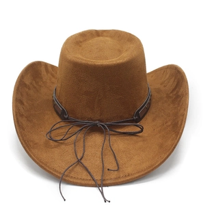 Detail of suede cowboy hat featuring brown synthetic leather band with bronze rivets
