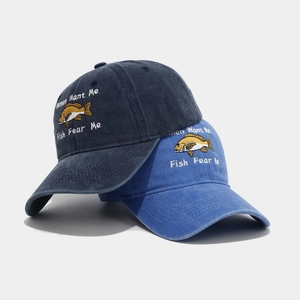 Washed cotton baseball caps with fish embroidery in navy and blue vintage styles