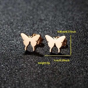 Golden butterfly stud earrings in stainless steel with compact geometric design
