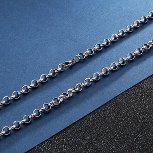 Polished silver stainless steel O-chain necklace with secure lobster clasp on blue background