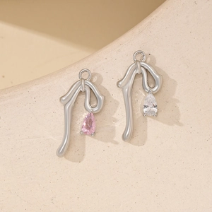Minimalist irregular silver metal bow pendants with pink and white zircon gemstones