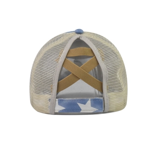 Detail view of cotton ponytail baseball cap featuring star pattern strap and breathable mesh