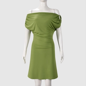Detail of slim fit grass green off-shoulder mini dress with elegant waist cut