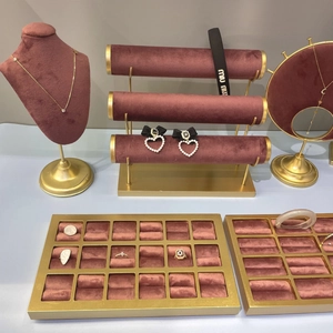Velvet jewelry display stand set with necklace bust and tiered bracelet holders in burgundy