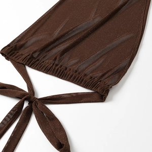 Detailed view of brown shimmering mesh fabric with ruched elastic hem and tie strings