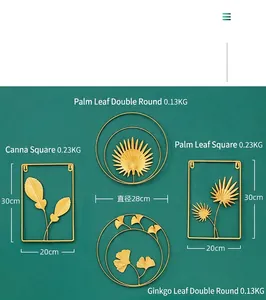 Detailed view of four luxury golden iron wall decor pieces featuring ginkgo and palm leaves
