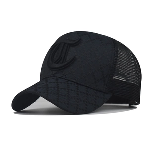 Detail of black trucker hat with diamond pattern fabric and 3D embroidered C logo