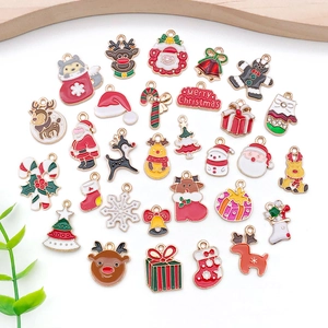 Detailed assortment of colorful Christmas enamel alloy charms with gold-plated edges